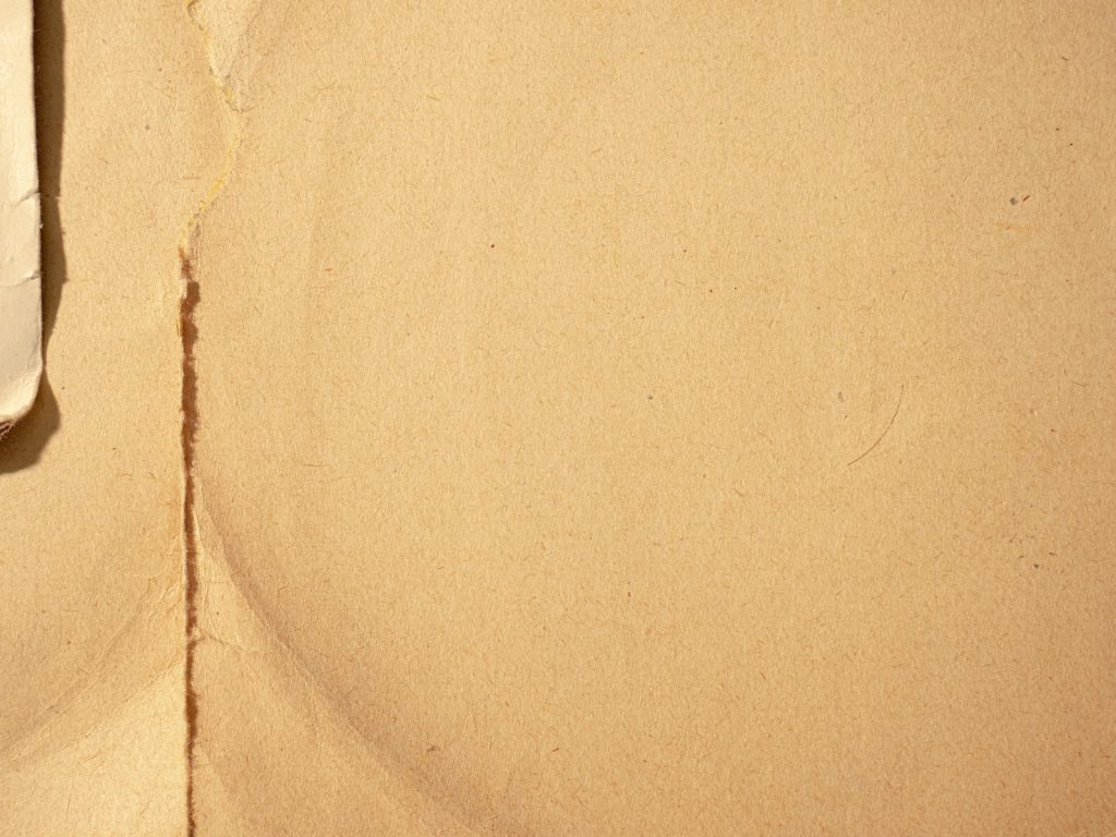 white textile on brown textile